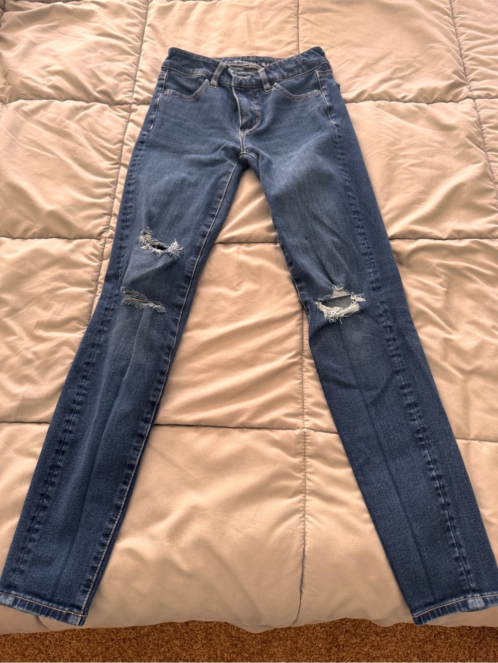 AMERICAN EAGLE THE DREAM JEAN Classic Women's Distressed Skinny Jeans in Blue